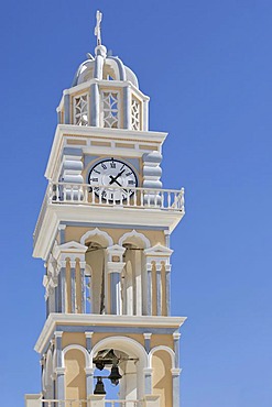 Tower with clock at the church Ag Ioannis Baptistis, Thira, Santorini, Greece