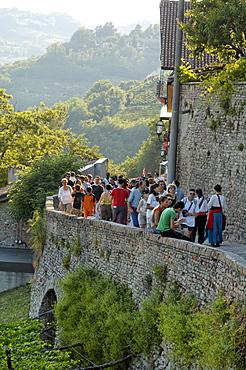 People on the city wall, Canelli, Asti Province, Piemont, Italy