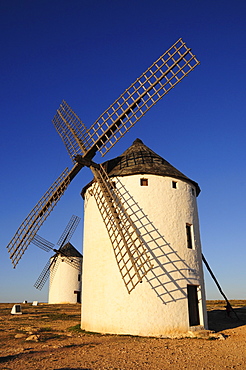 Windmills in afternoon light, Campo de Criptana, Castilla-La Mancha region, Spain