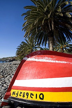 A fishing boat on the beach, Santa Cruz, Madeira, Portuga