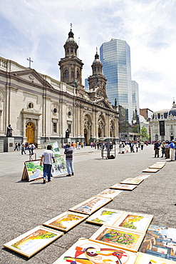 Cathedral and street vendors selling art at Plaza de Armas (all main squares in Chile go by this name), Santiago de Chile, Chile, South America