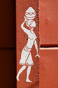 Decoration on a wall, woman carrying jar on the head, Cape Town, South Africa