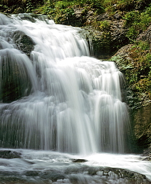 Small waterfall in a mountain stream, movement