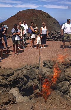 Demonstration of the geothermal energy in the National park Timanfaya, Lanzarote, Canary Islands, Spain