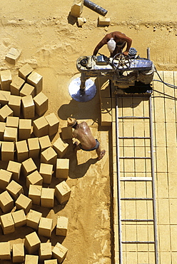 Quarrying of limestone for house building, Malta