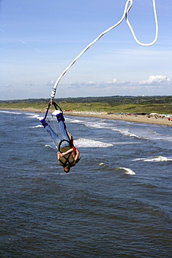 Bungee Jumping from the pier over the North Sea, Scheveningen, The Hague, The Netherlands, Europe