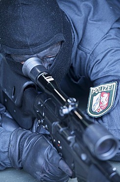 DEU, Germany: Sniper. Police SWAT Team, for arresting armed and dangerous criminals. They are specialists for rescuing hostages. They have special weapons and equipment.