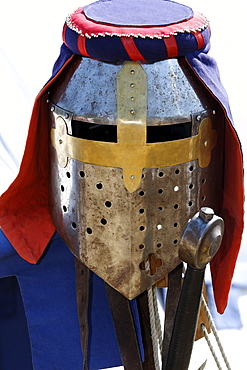 Knights helmet with eye slits decorated with colourful headband, knights camp, Flachsmarkt Burg Linn, Krefeld, Lower Rhine, North Rhine-Westphalia, Germany, Europe