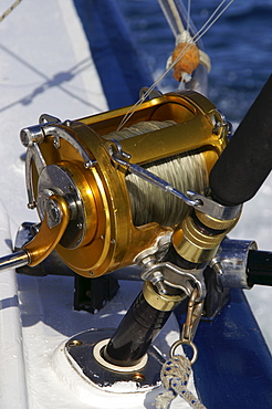 Sea fishing rod on a fishing boat, Mauritius, Mascarenes, Indian Ocean