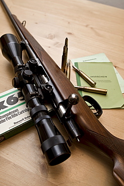 Two hunting weapons, shotguns, long guns with engraving, shooting license and gun ownership license