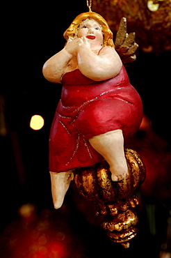 Christmas ornament, figure of a plump woman wearing red dress