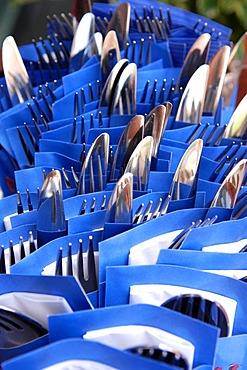 Cutlery wrapped in blue serviettes in a restaurant, Nuremberg, Middle Franconia, Bavaria, Germany, Europe