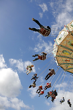 People driving with a chairoplane, Hamburg, Germany