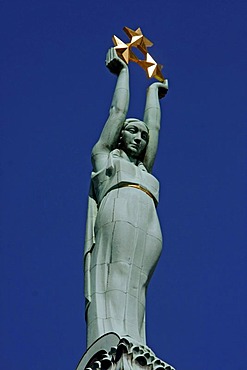 Allegory of Freedom statue on top of the Freedom Memorial in Riga, Latvia, Baltic states