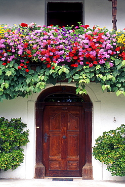 Flower decorations on a house, Kramsach, Tyrol, Austria, Europe