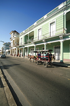 Colonial-style building lining a street in Cienfuegos, Cuba, Caribbean, Americas