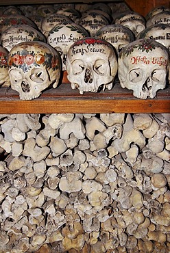 Skull skulls paint ossuary charnel house Hallstatt, Salzkammergut, upper Austria, Austria