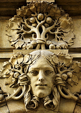 Stone face on a building facade in the historic centre of Prague, Czech Republic, Europe