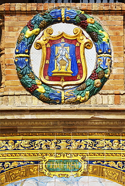 Emblem of Ciudad Real on the palace Palacio de Espana, Seville, Andalusia, Spain