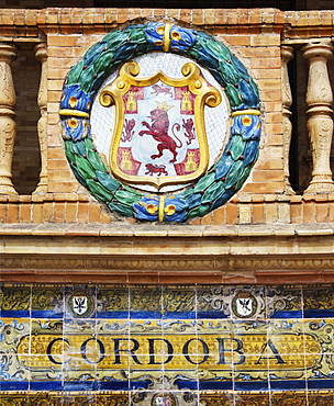 Emblem of Cordoba on the palace Palacio de Espana, Seville, Andalusia, Spain