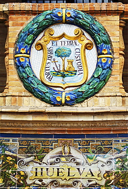 Emblem of Huelve on the palace Palacio de Espana, Seville, Andalusia, Spain