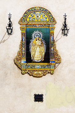 Image of St. Mary on ornate ceramic tiles, outside walls of a church in Seville, Andalusia, Spain, Europe