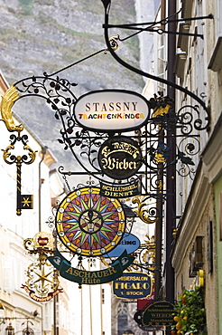 Advertising signs in a alley in Salzburg, Austria