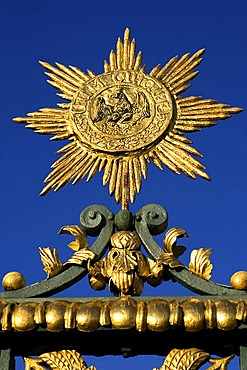 Golden sun with armof eagle castle Charlottenburg, Berlin, Germany