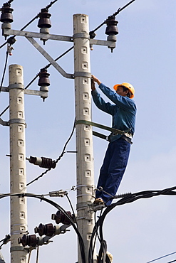 Electrician at work, Vietnam, Asia