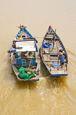 Fishermen on the red river, Da Nang, Vietnam, Asia