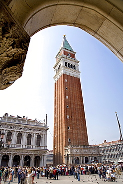 View through an arcade towards Campanile, St. Mark's Square, Venezia, Venice, Italy, Europe