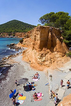 Tourists in Sa Caleta Bay, Ibiza, Balearic Islands, Spain, Europe