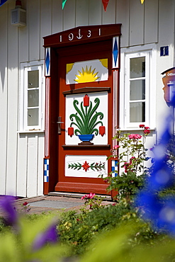 Colourfully painted door on the captain's house, Prerow, Darss, Mecklenburg-Western Pomerania, Germany, Europe