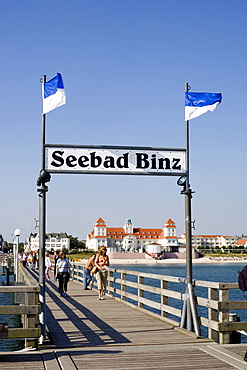 Pier and kurhaus, sign indicating Seebad Binz or Binz Coastal Resort, Ruegen Island, Baltic Sea, Mecklenburg-Western Pomerania, Germany, Europe