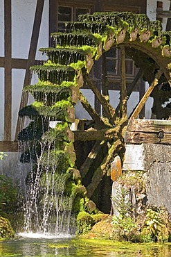 An old mill wheel near the Blautopf Spring, Blaubeuren, Baden-Wuerttemberg, Germany