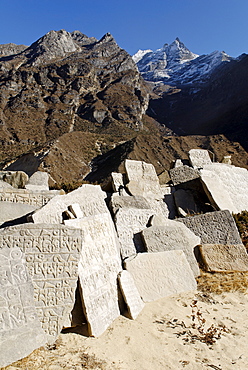 Mani wall at Thame Sherpa village with Khumbi Yu La (Khumbila, 5761), Sagarmatha National Park, Khumbu Himal, Nepal