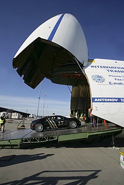 Sportscars competing in the illegal car-race "Gumball 3000" are loaded into two Antonov cargo-aircrafts. Frankfurt/Hahn, Rhineland-Palatinate, Germany