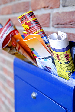 Advertising brochures in a mailbox