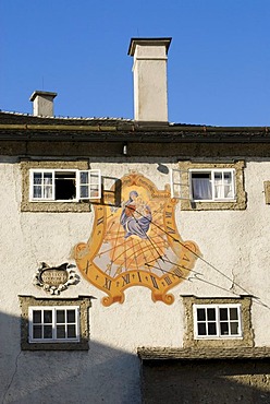 Old house with sun dial at Mozartplatz Salzburg Austria