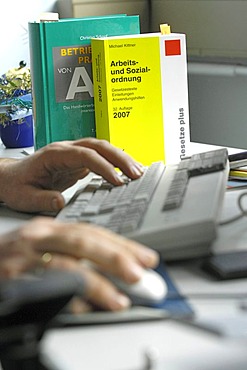 Book on the desk of a shop steward - "law of laber".