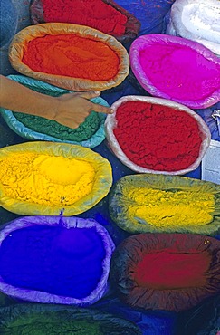 Brightly-coloured sacs of powder at a market, Tihar Festival, five-day festival of light and colour, celebrated annually in October to honour animals, Kathmandu, Nepal, Asia