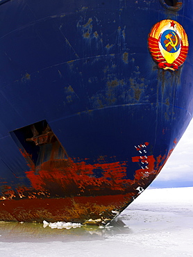 The bow of the Captain Khlebnikov icebreaker in ocean ice in McMurdo Sound, Antarctica