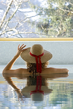 Woman at the side of a pool