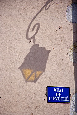 Shadow of a street lamp on a house wall, Annecy, Haute Savoie, France, Europe