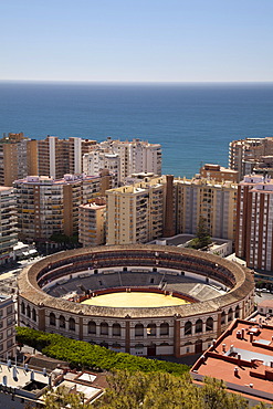 View from Monte de Gibralfaro over a bullring surrounded by skyscrapers, MâˆšÂ°laga, Andalucia, Spain, Europe, PublicGround