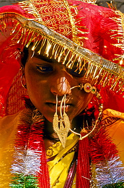 Bride with the typical wedding jewellery during the wedding ceremony, in the village of Gangi, India, Asia