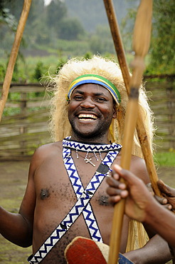 Traditional dancer during a folklore event in a village of former hunters near the village of Kinigi on the edge of the Volcanoes National Park, Parc National des Volcans, Rwanda, Africa