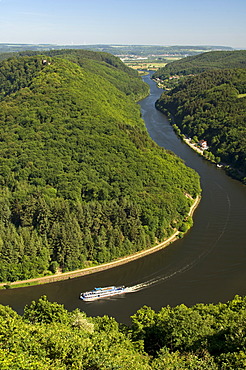 Excursion boat cruising on one arm of the big loop of the Saar river near Mettlach, Saarland, Germany, Europe