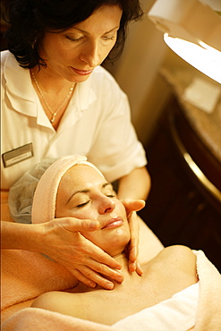 Woman having a face massage