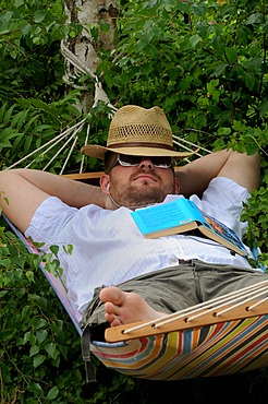 Man sleeping in a hammock